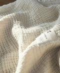 Ultra-Soft 100% Cotton Crinkle Yarn Throw Blanket in Cream with Tassels - Perfect for All Seasons, Cozy Nap & Bedding Accessory CozyHaus